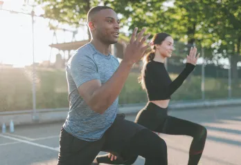 Couple working out outdoors