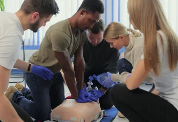 A diverse group of students at a CPR class.