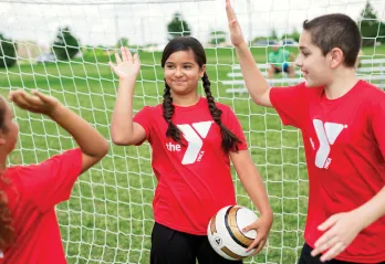 children playing soccer