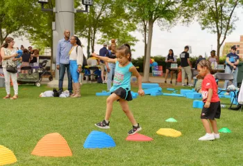 Child playing lawn games at Healthy Kids Day 2024