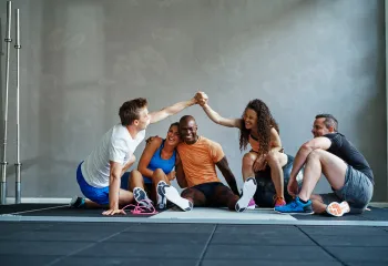 Group of people having fun at the gym