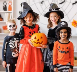 young children in halloween costumes