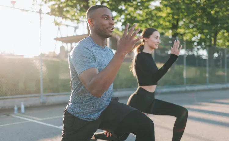 Couple working out outdoors