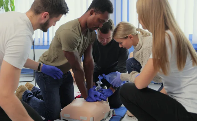 A diverse group of students at a CPR class.