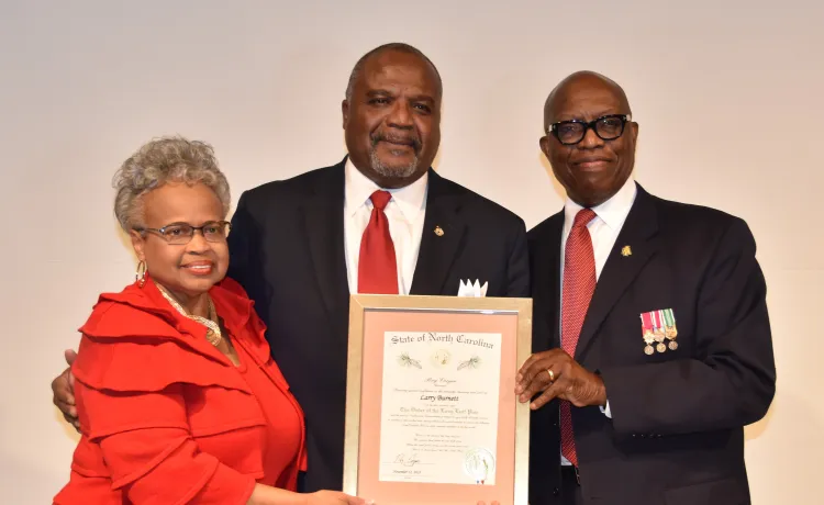 Larry Burnett receives the NC Long Leaf Pine Award