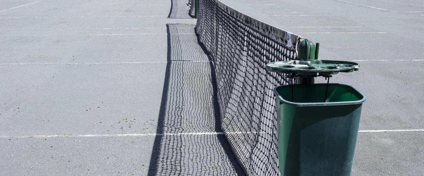 A photo of the outdoor tennis court at the Eden YMCA.