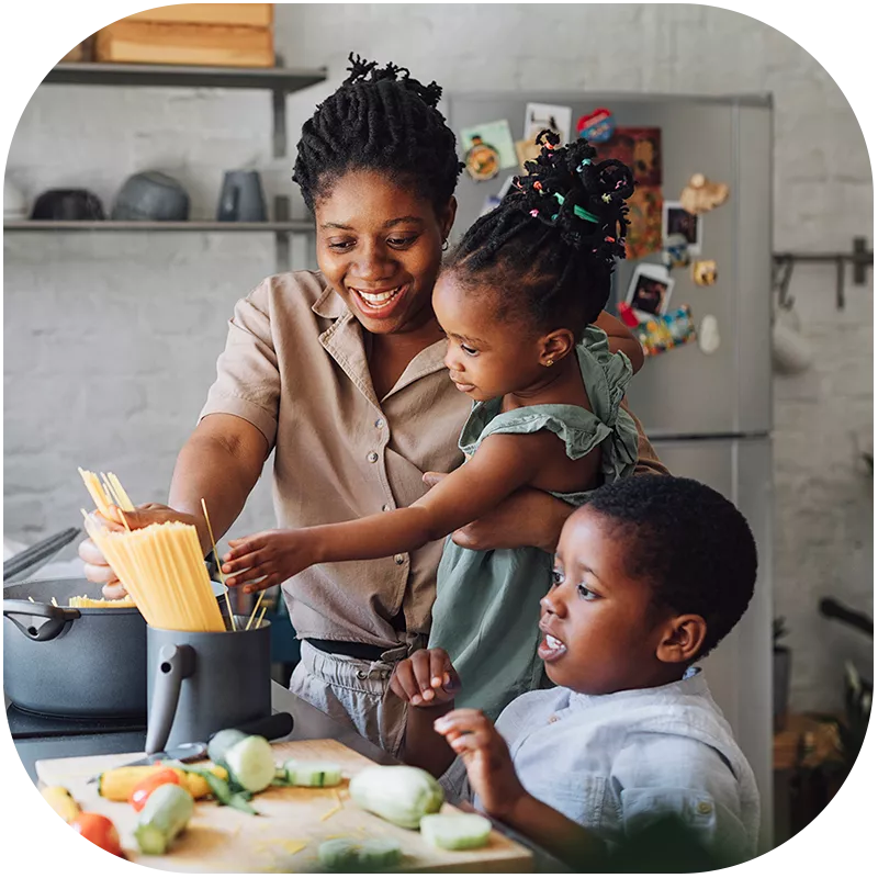 Family cooking a healthy meal. 